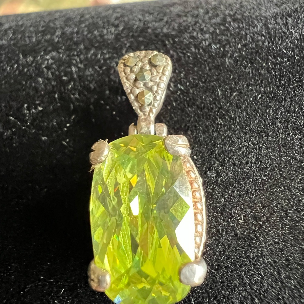 Vibrant Marcasite Green Cubic Zirconia in a vintage looking silver tone setting